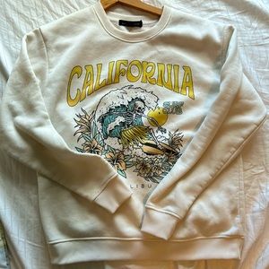 White crewneck sweater